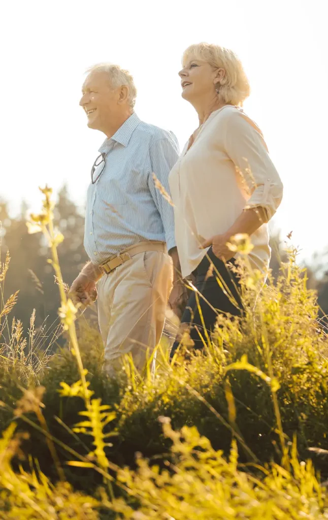 retired couple walking outdoors together core principles